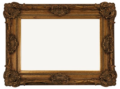 Lot 98 - A carved giltwood wall mirror