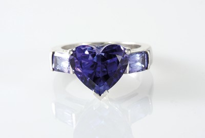 Lot 16 - 18ct white gold three stone heart-shaped tanzanite dress ring