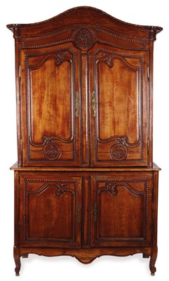Lot 48 - A French provincial oak buffet à deux corps