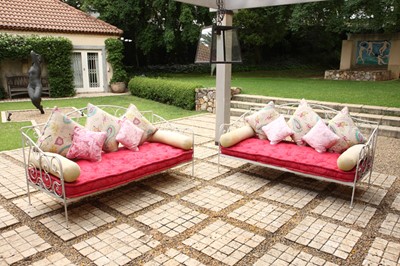 Lot 64 - A pair of white painted metal day beds, in the French style