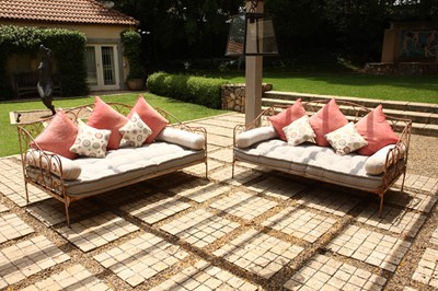 Lot 65 - A pair of rust patina metal day beds, in the French style
