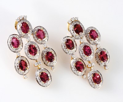 Lot 9 - 14ct yellow gold and rhodium plate pair of rhodolite garnet and diamond drop stud earrings