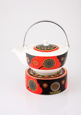Lot 124 - Ritzenhoff My Lian teapot and warmer designed by Dominic Pangborn