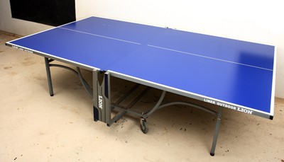 Lot 177 - A Lion liner outdoor table tennis set