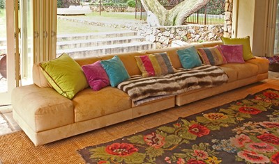 Lot 92 - A tan leather modern sofa in two sections