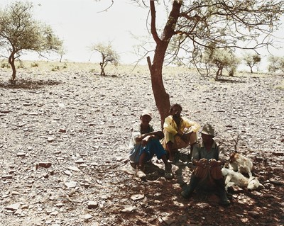 Lot 35 - David Goldblatt, South African 1930–2018 , Three men rest at the side of the track between Bute asbestos Mine and Heuningvlei in Northern Cape