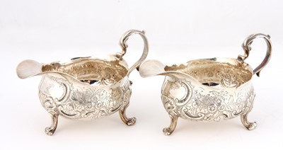 Lot 24 - ,A pair of Georgian silver sauceboats, London, 1828, made by Edward Barton