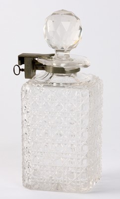 Lot 9 - ,A late 19th century square whisky decanter with overall lattice cutting, star cut base, a globular stopper cut with triangular pattern with attached locking mechanism